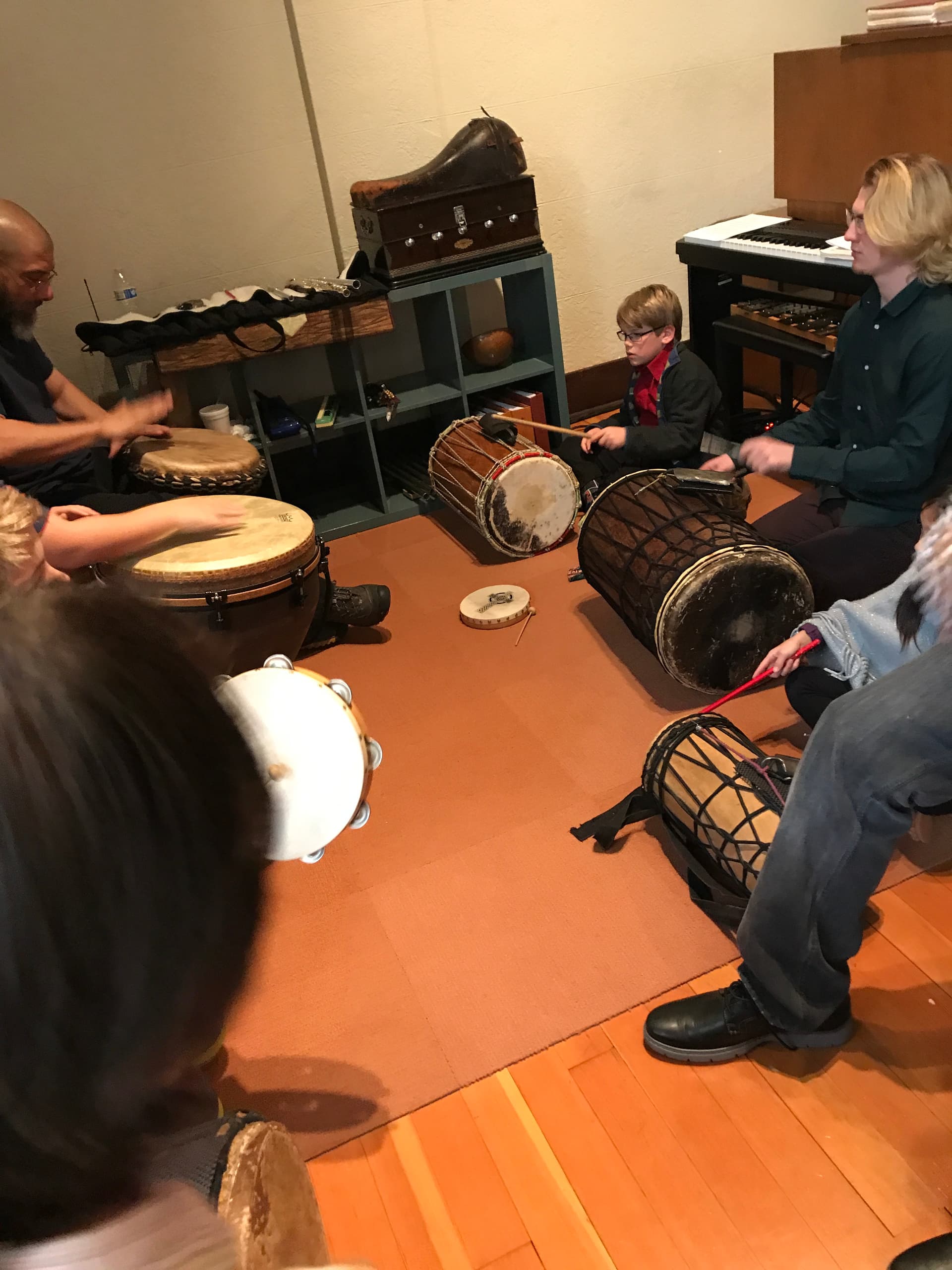 Children playing music at a workshop