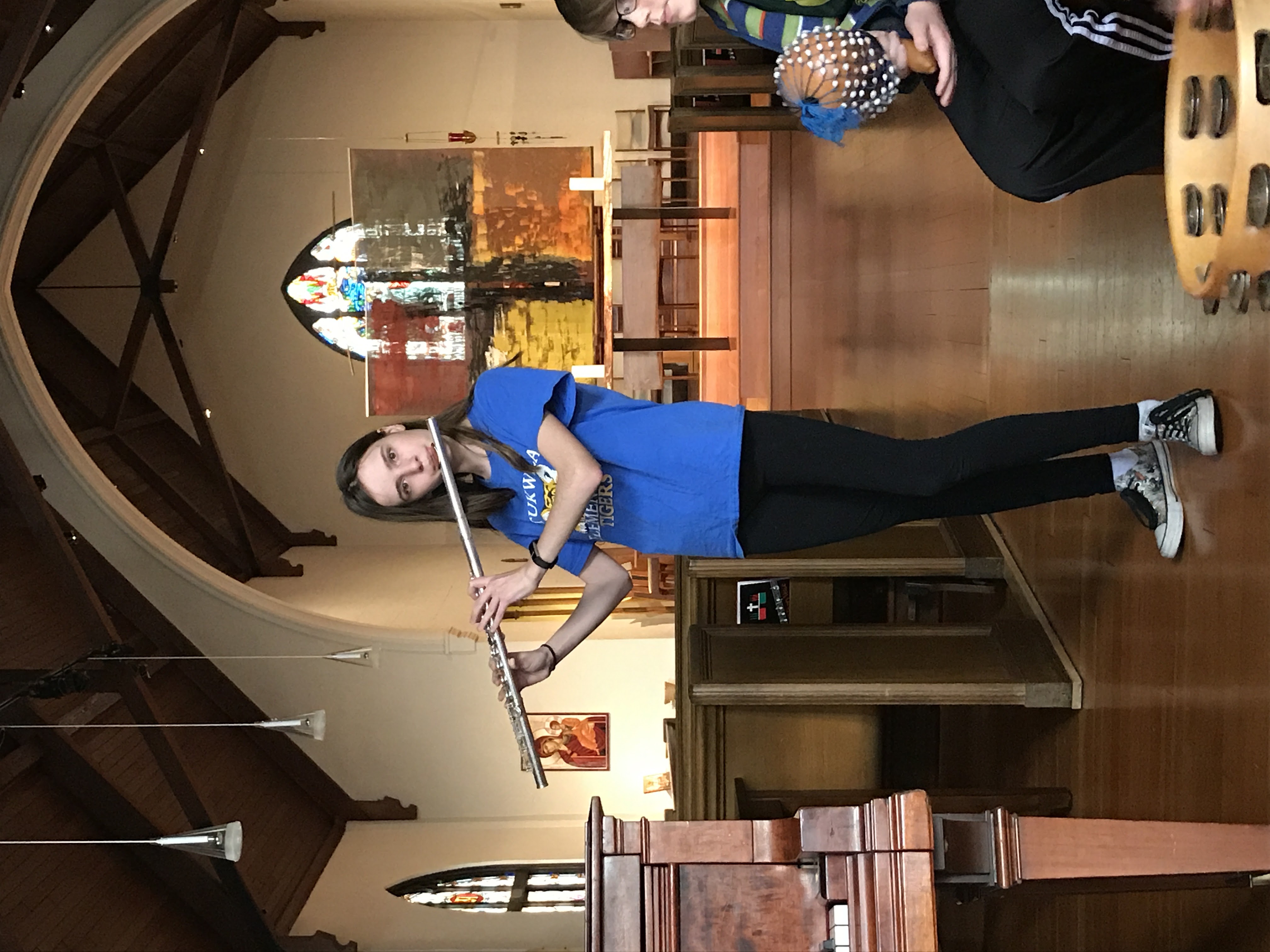 Young musician in trombone spotlight