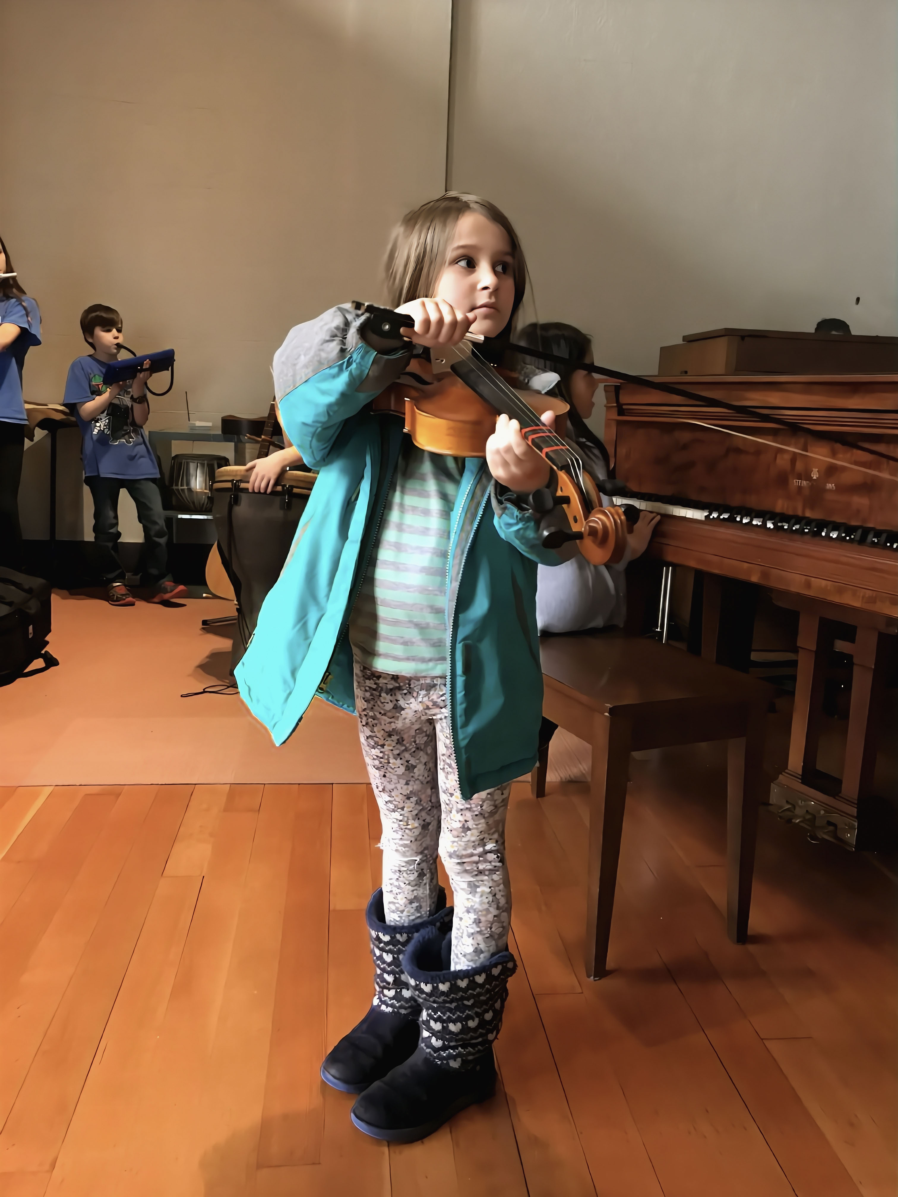 Violinist leading peers with various instruments
